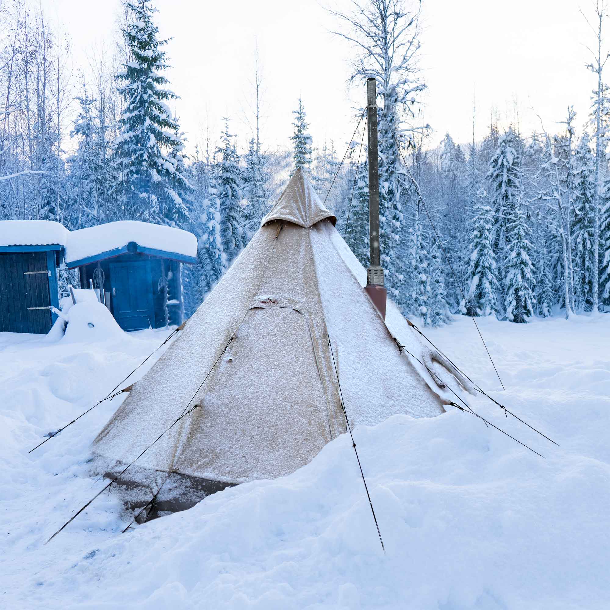 A tent placed in a snowy winter landscape, with snow - covered ground and trees in the background.