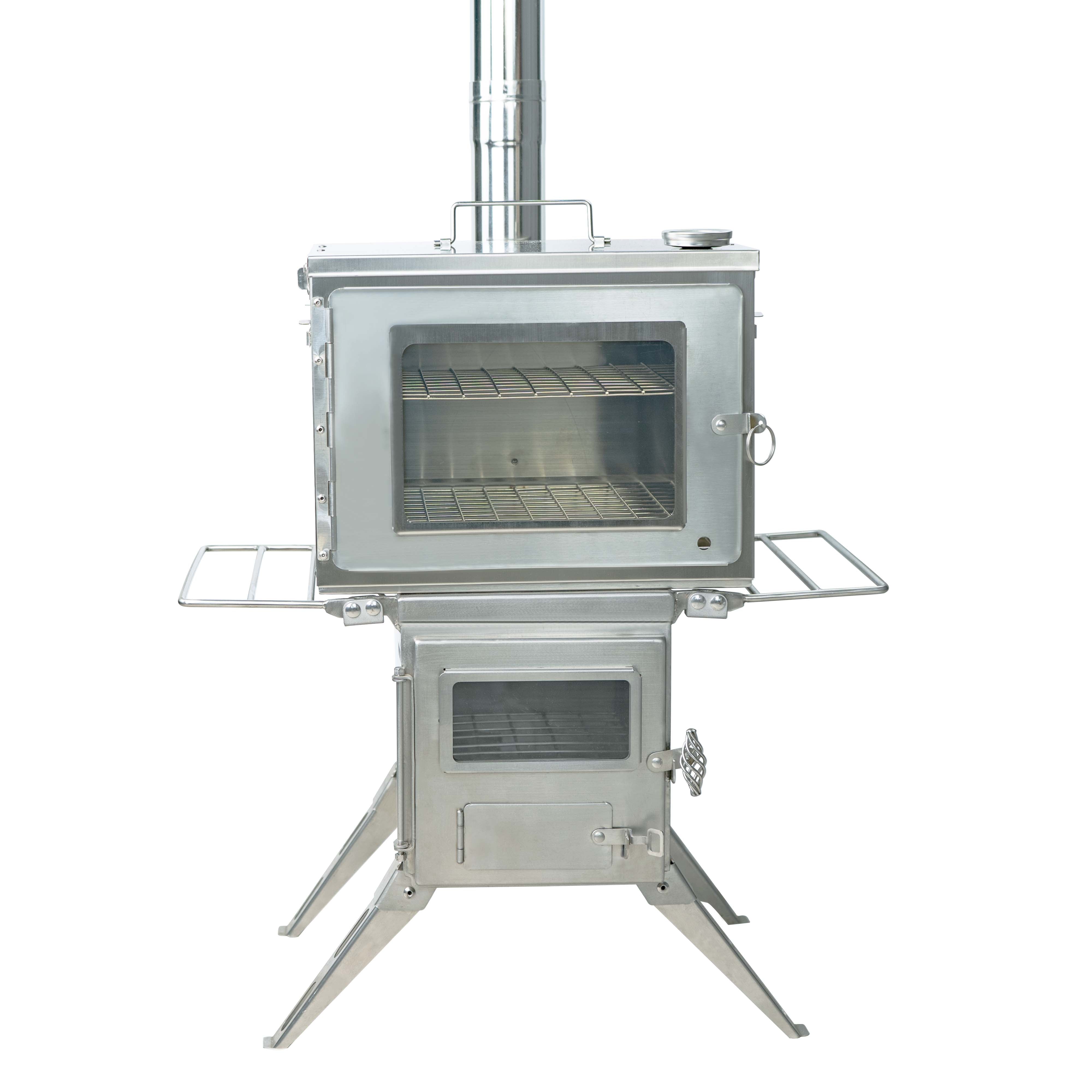 Winnerwell® Fastfold Oven mounted on a stove, demonstrating its elevated position for easier access during outdoor baking and cooking activities.