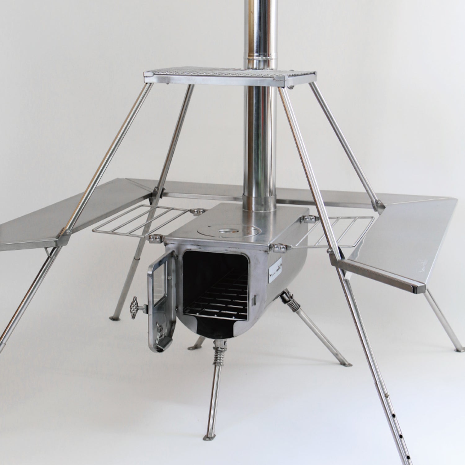 Another isolated view of Winnerwell® Fire Guard Stove Table, showcasing its sturdy frame and functional layout from a different angle.