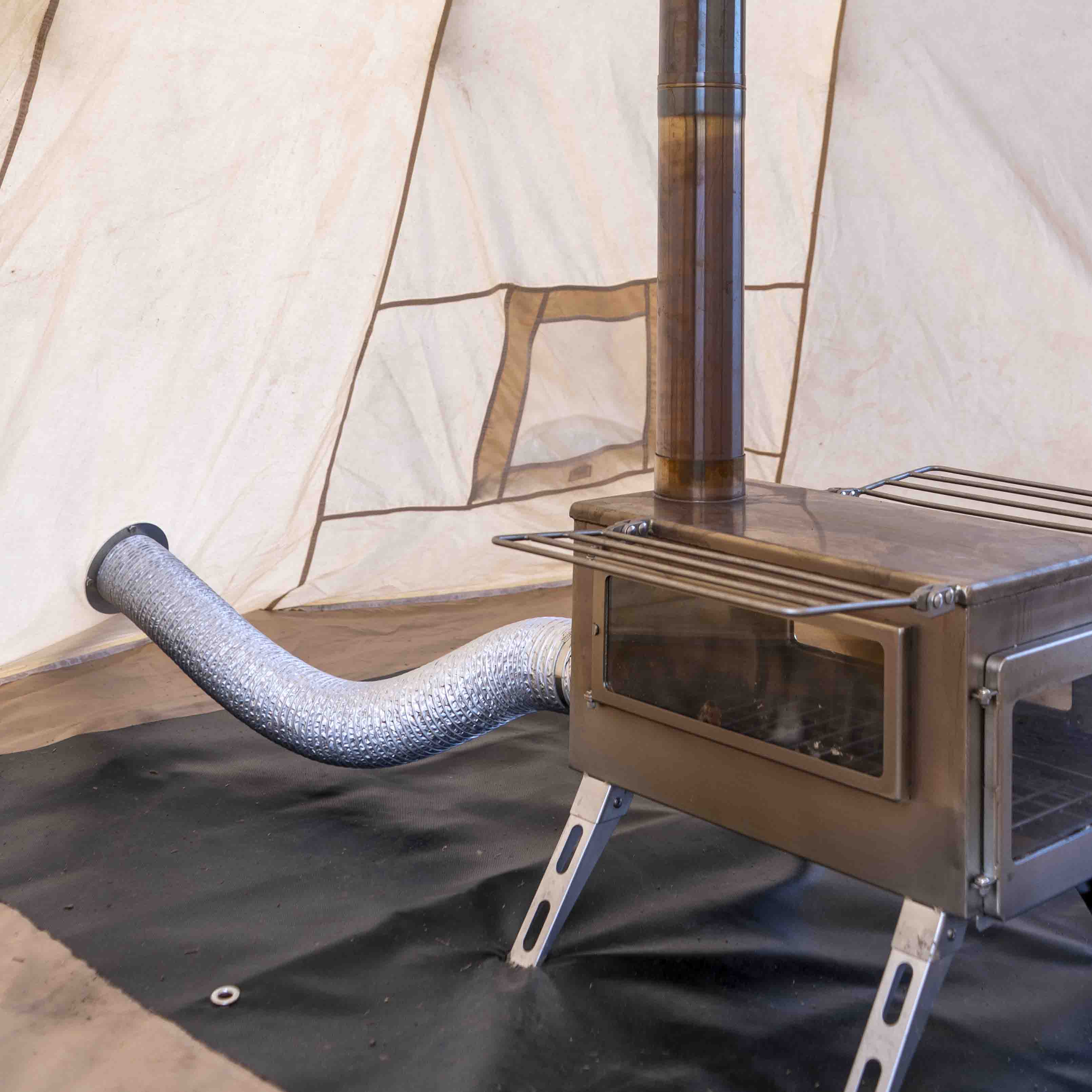 Winnerwell® L - sized Opener & Seal Set integrated with an L - sized stove and tent setup