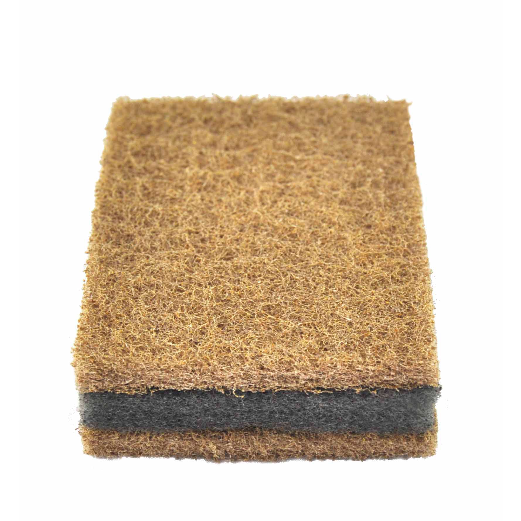 Close-up of Winnerwell® Scrubbing Sponge, emphasizing its tough scrubbing surface and gentle layer for versatile cleaning.