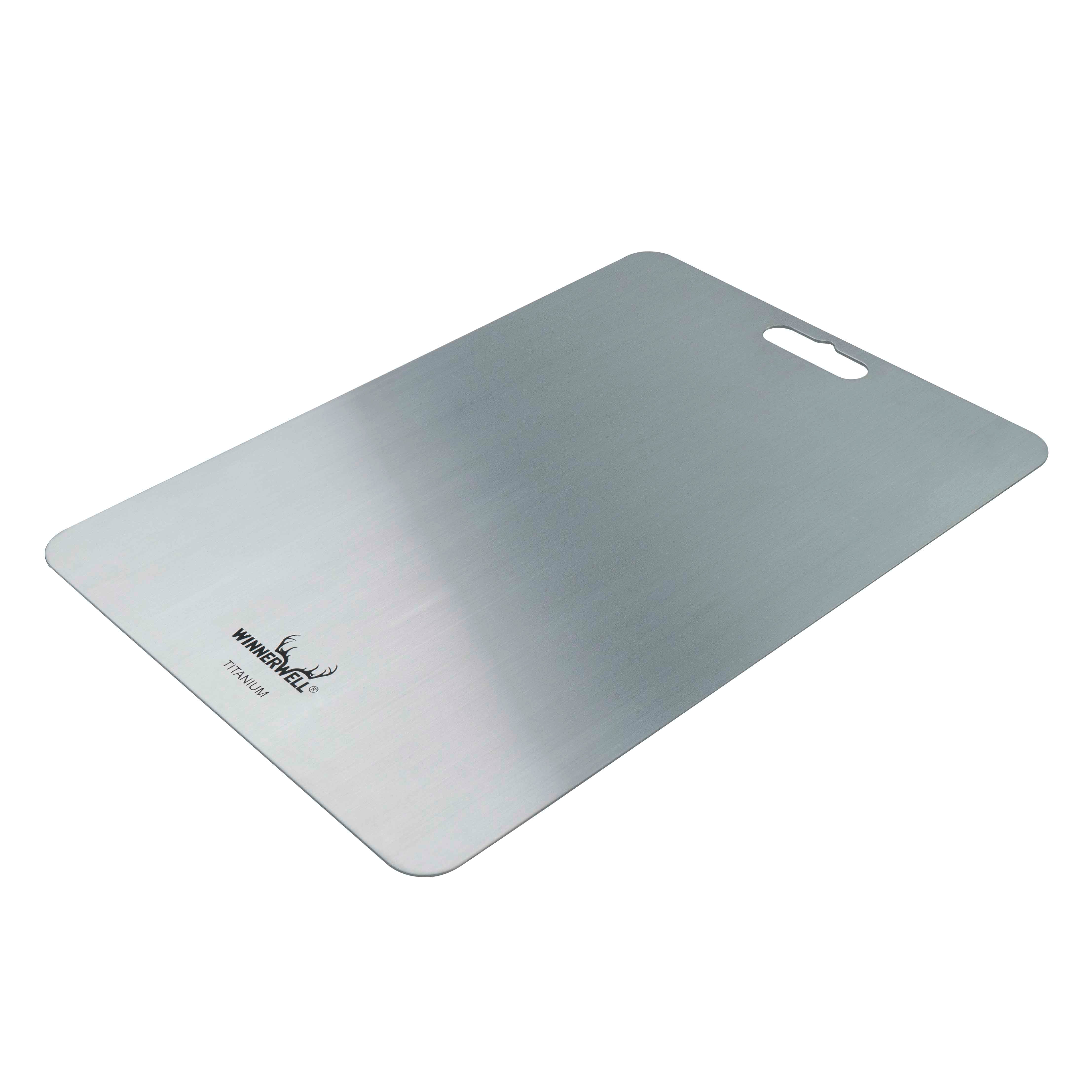 Another angle view of Winnerwell® titanium cutting board, presented on a white background to display its smooth surface and overall structure.